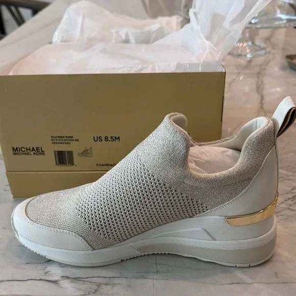 Michael Kors Women's Champagne Slip-On Sneakers - Picture 1 of 6